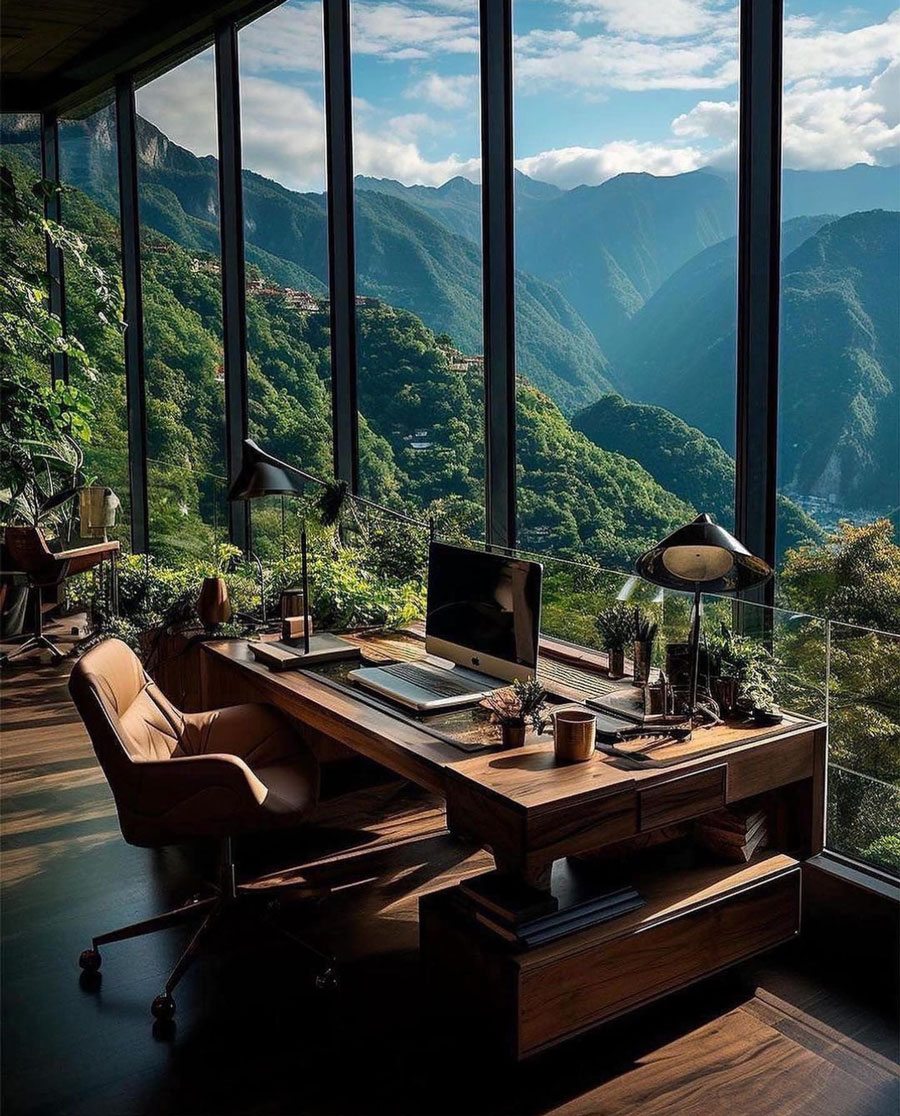 Small personal desk home office looking over valley views below