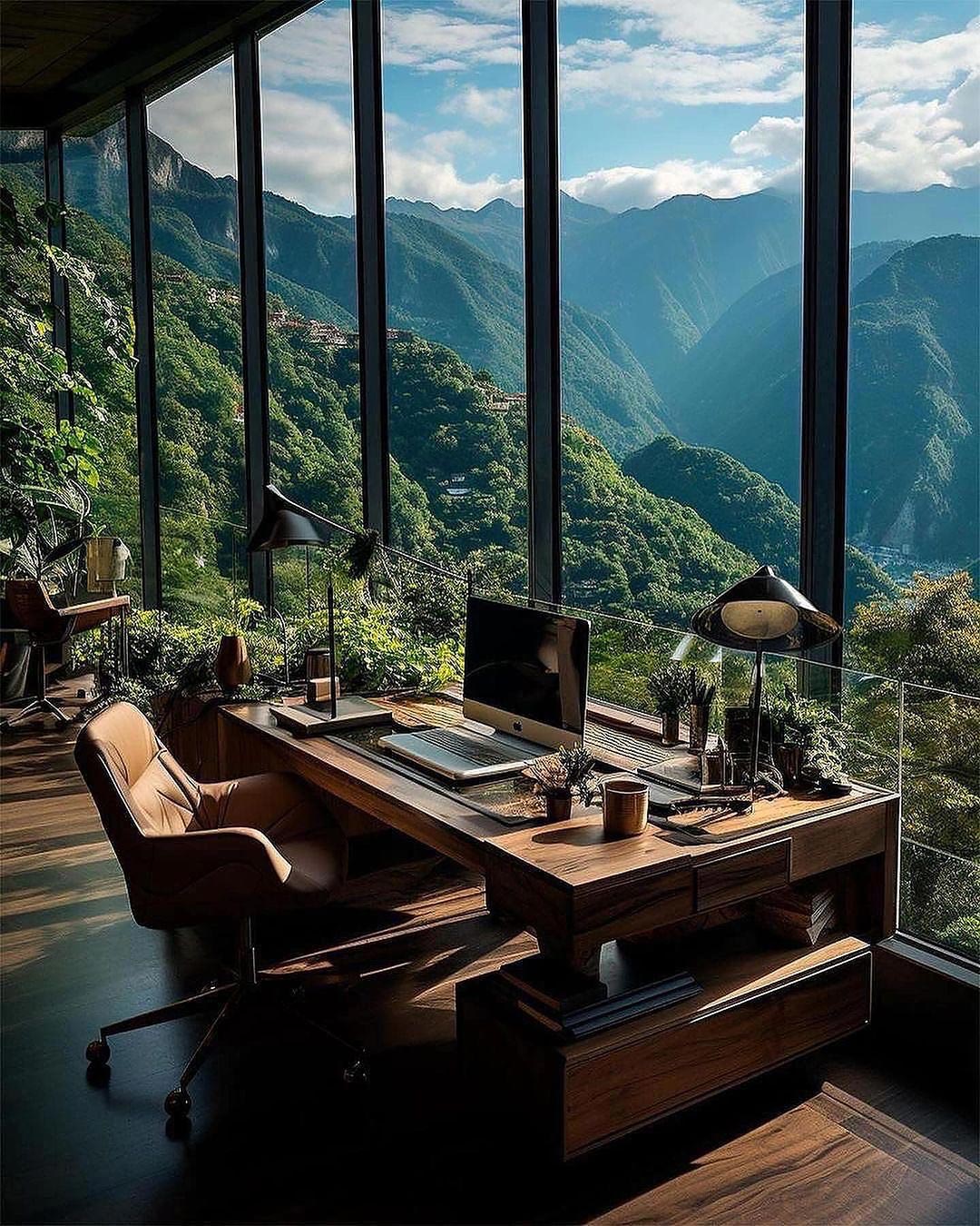 Home office overlooking lush green valley below